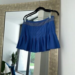 Lucky in Love: blue tennis skort- size L runs small size up. (Lightly warn)